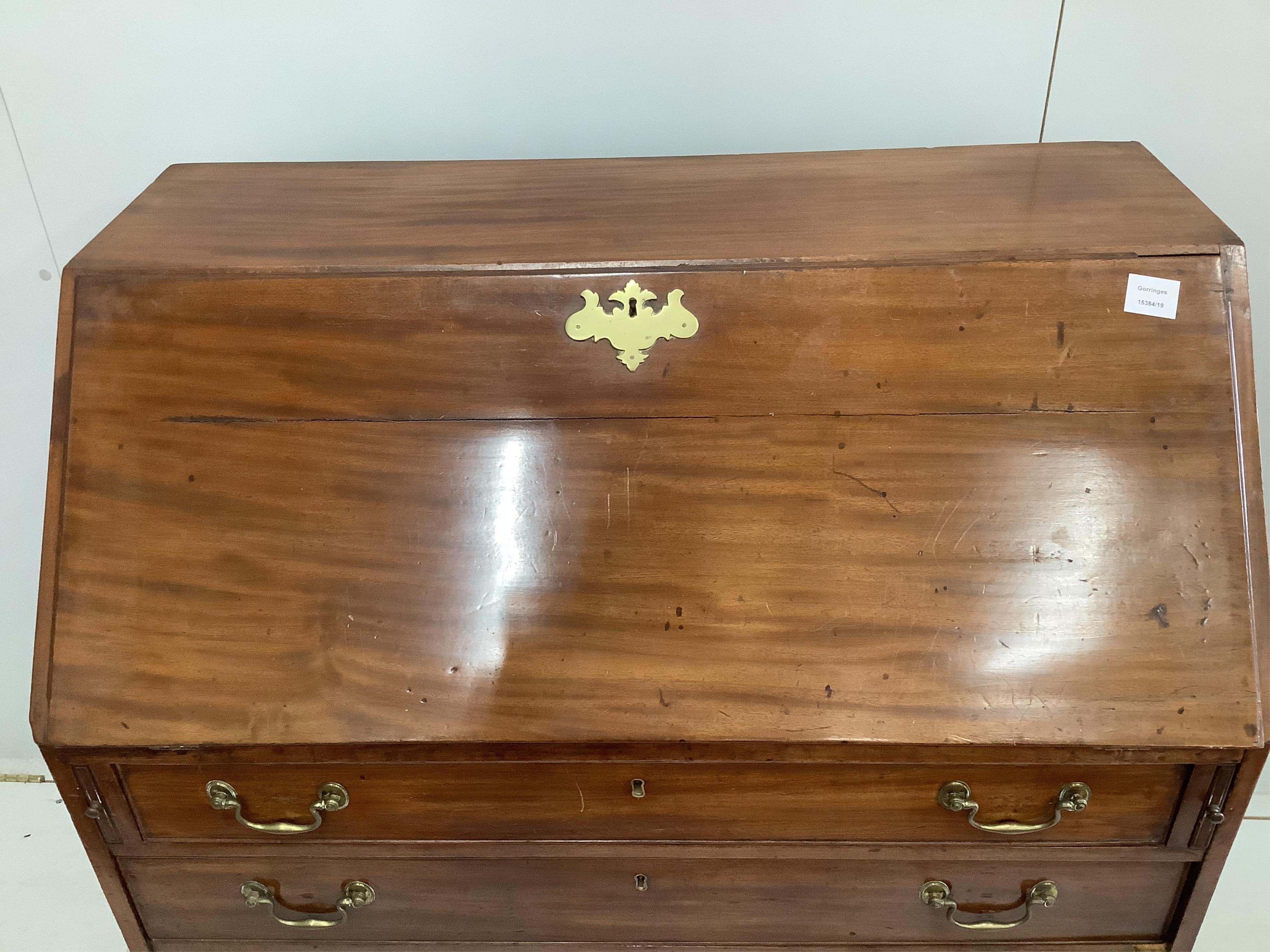 A George III mahogany bureau, width 100cm, depth 54cm, height 112cm. Condition - poor